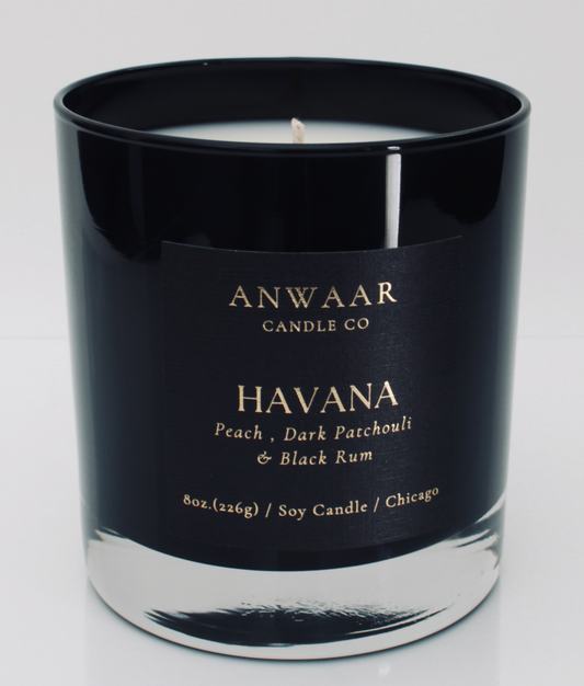 Havana - black elegant candle vessel with black label and ogld letters with details about the product